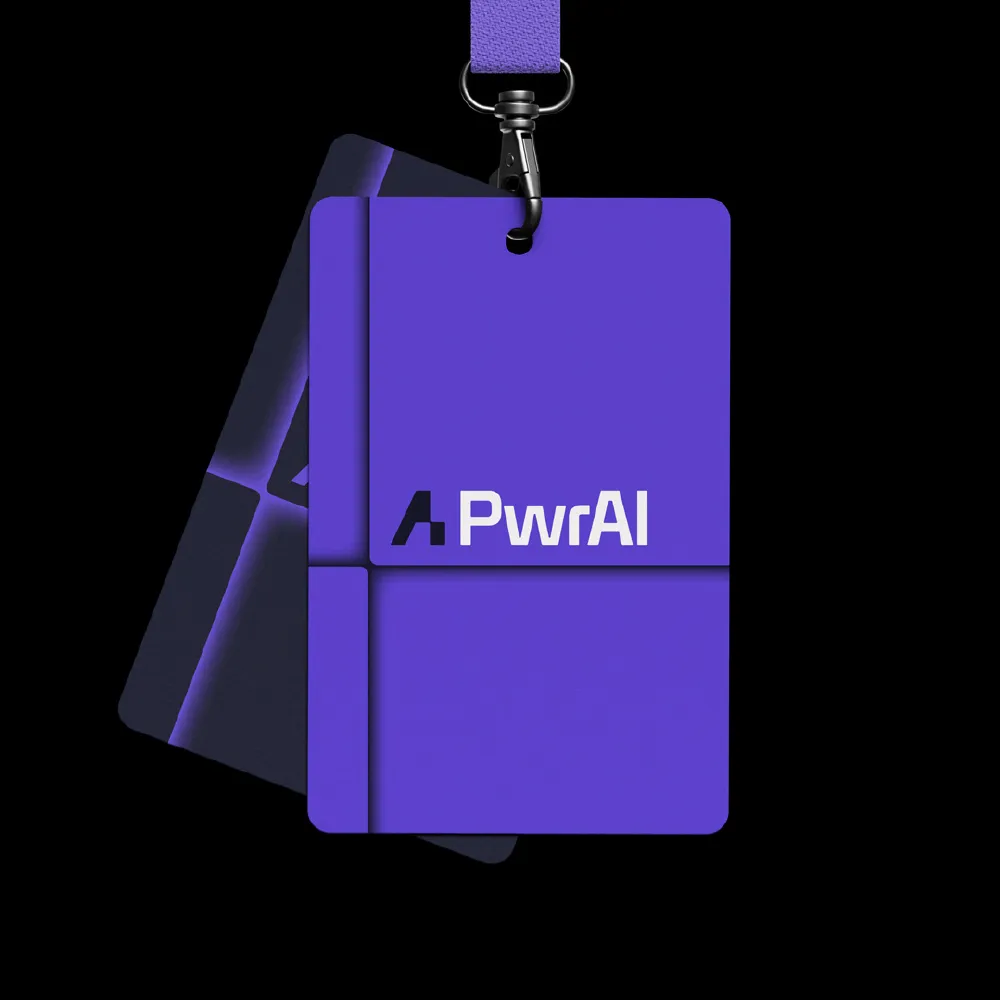 Purple event badge with a lanyard featuring the PwrAI logo on a black background.